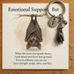 Keychain with a bat providing emotional support and a card with a message
