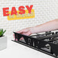 Stainless steel adjustable gap guard for between the stove edge and countertop